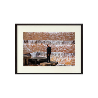 P-10-101-117-103-0005-1.jpg;Waterfall, full color, pensive figure, person, eyes closed, concrete, stone, water, reds