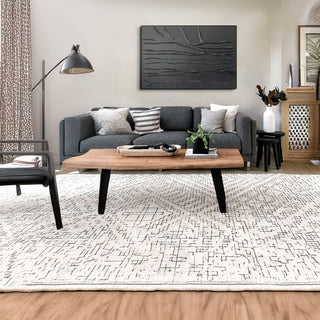 Modern living room with gray sofa, wooden coffee table, and decorative elements.

sku: S-10-103-122-107-0010-6